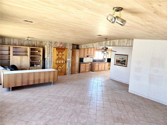 195 Old El Mirage Rd, Adelanto, CA 92301 - unfurnished living room featuring wooden ceiling, a ceiling fan, and wood walls
