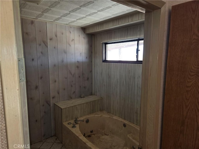 195 Old El Mirage Rd, Adelanto, CA 92301 - full bath featuring a jetted tub, wood walls, and tile patterned flooring