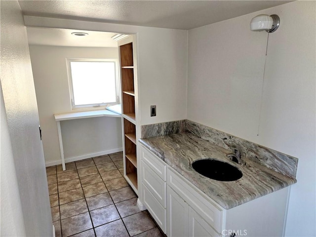 195 Old El Mirage Rd, Adelanto, CA 92301 - bathroom with baseboards, tile patterned floors, and vanity