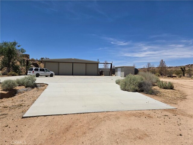 195 Old El Mirage Rd, Adelanto, CA 92301 - view of front facade featuring an outbuilding and a garage
