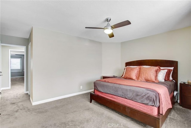 5840 Fairlane Dr, Riverside, CA 92506 - carpeted bedroom featuring baseboards and a ceiling fan