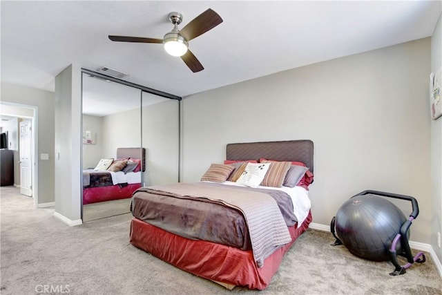 5840 Fairlane Dr, Riverside, CA 92506 - bedroom with carpet flooring, a closet, ceiling fan, and baseboards