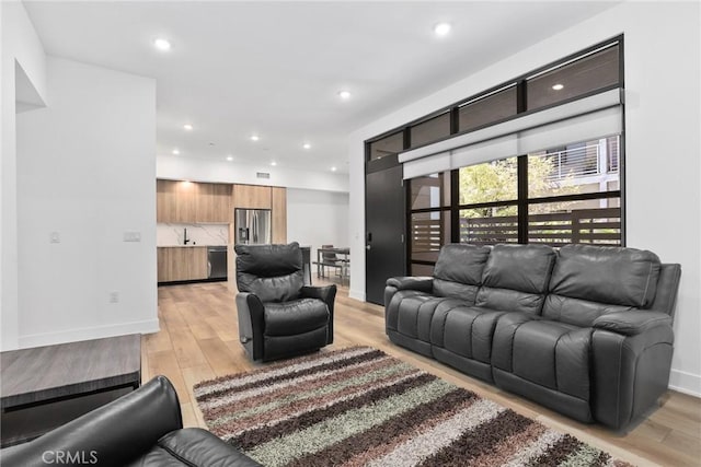 178 S Euclid Ave Unit 106, Pasadena, CA 91101 - living room with recessed lighting, light wood-style flooring, and baseboards
