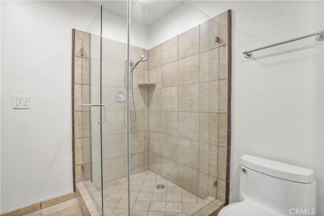 11970 Montana Ave Unit 102, Brentwood, CA 90049 - bathroom featuring a shower stall and toilet