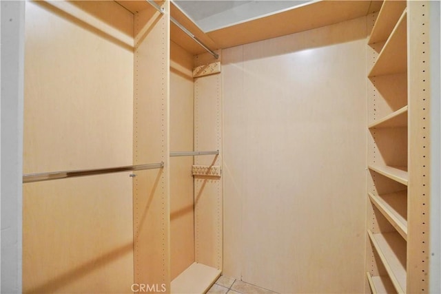 11970 Montana Ave Unit 102, Brentwood, CA 90049 - spacious closet featuring tile patterned flooring