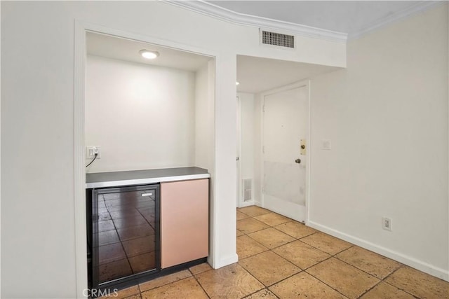 11970 Montana Ave Unit 102, Brentwood, CA 90049 - bar with beverage cooler and crown molding