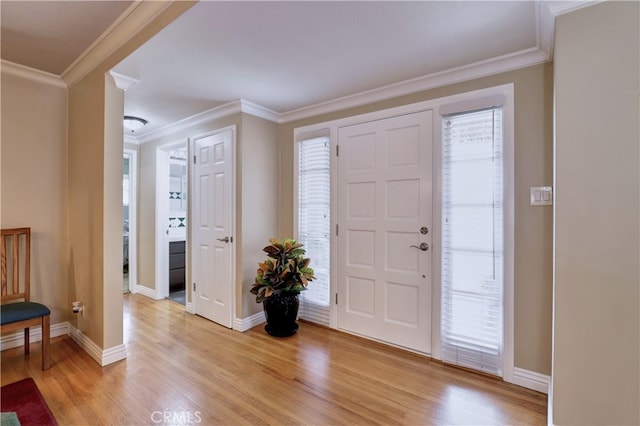 14522 San Feliciano Ln, Mirada, CA 90638 - foyer entrance featuring light wood-style floors, ornamental molding, and baseboards