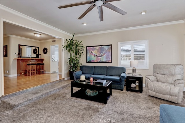 14522 San Feliciano Ln, Mirada, CA 90638 - living room with carpet, ceiling fan, crown molding, and baseboards