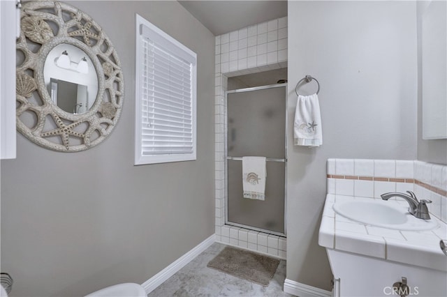 14522 San Feliciano Ln, Mirada, CA 90638 - full bathroom featuring a shower stall, baseboards, vanity, and toilet