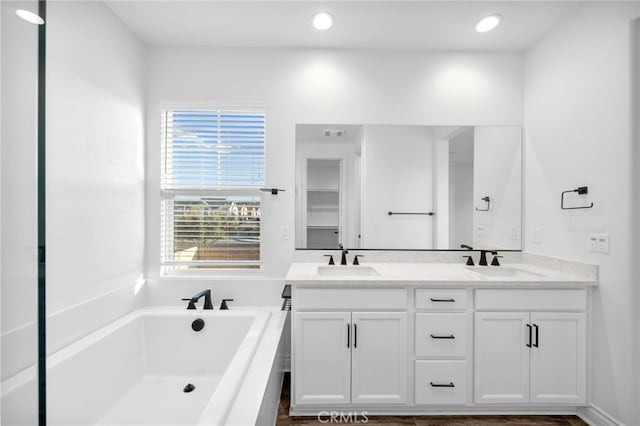 32129 Dymondia Way, Temecula, CA 92591 - full bath featuring double vanity, a garden tub, and recessed lighting