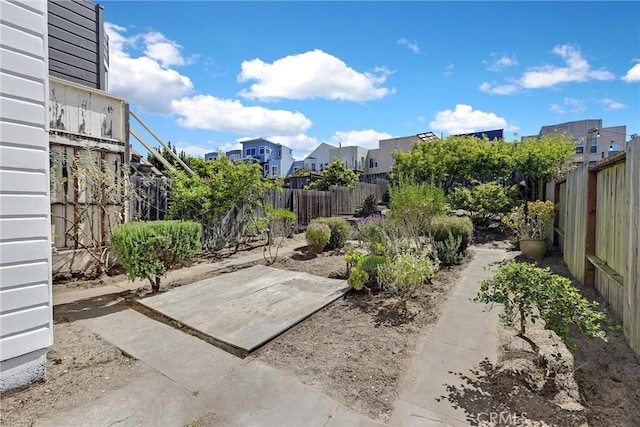 874 41st Ave, San Francisco, CA 94121 - fenced backyard with a patio area and a residential view