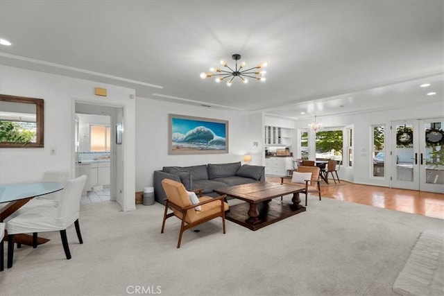 1801 Laurel Ave, Manhattan Beach, CA 90266 - living area with a chandelier, recessed lighting, french doors, and light carpet