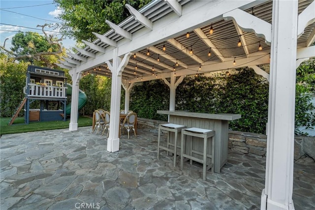 14332 Roblar Pl, Sherman Oaks, CA 91423 - view of patio / terrace with a playground and outdoor dining area