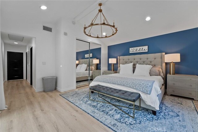 14332 Roblar Pl, Sherman Oaks, CA 91423 - bedroom featuring vaulted ceiling, a chandelier, wood finished floors, a closet, and baseboards