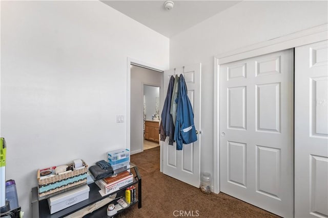 21620 Garibaldi Ct, California City, CA 93505 - bedroom featuring dark colored carpet and a closet