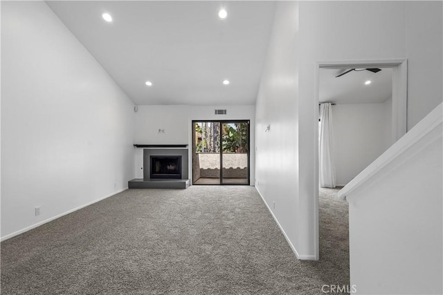 1188 Via Montoya, Camarillo, CA 93010 - unfurnished living room featuring carpet flooring, a fireplace with raised hearth, recessed lighting, baseboards, and ceiling fan