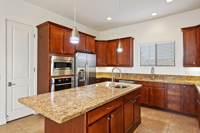 74158 Pele Pl, Palm Desert, CA 92211 - kitchen with a sink, appliances with stainless steel finishes, light tile patterned flooring, light stone counters, and recessed lighting