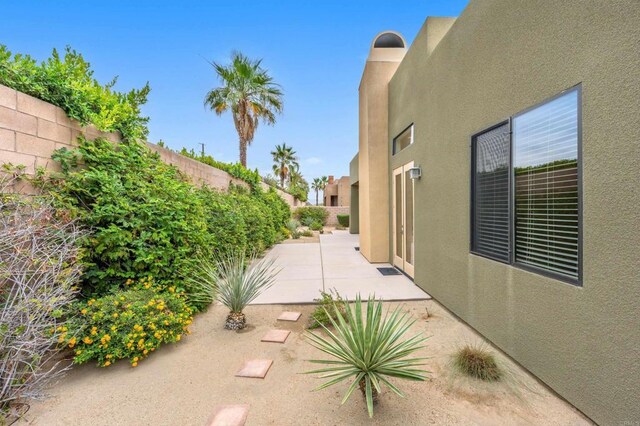 74158 Pele Pl, Palm Desert, CA 92211 - view of yard featuring a patio