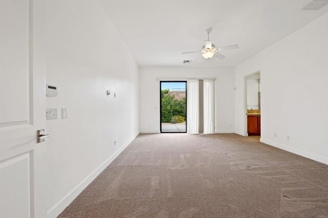 74158 Pele Pl, Palm Desert, CA 92211 - empty room with ceiling fan, carpet, and baseboards