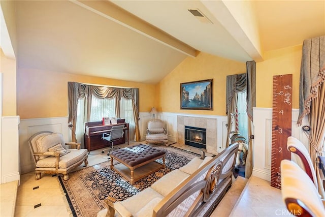 2445 N Santiago Blvd, Orange, CA 92867 - living area featuring a decorative wall, tile patterned floors, a wainscoted wall, and a tile fireplace