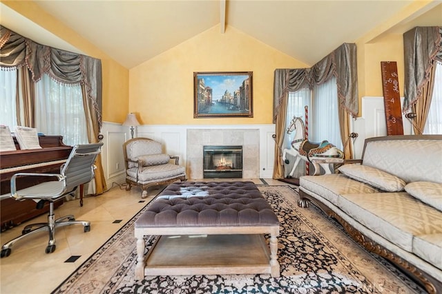2445 N Santiago Blvd, Orange, CA 92867 - living room featuring a decorative wall, plenty of natural light, wainscoting, and a tiled fireplace