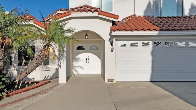 2445 N Santiago Blvd, Orange, CA 92867 - view of front of home with a tiled roof, concrete driveway, and stucco siding