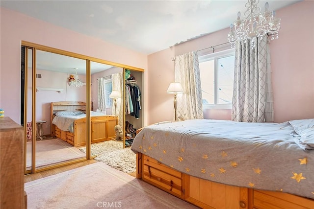 2445 N Santiago Blvd, Orange, CA 92867 - bedroom featuring wood finished floors and a closet