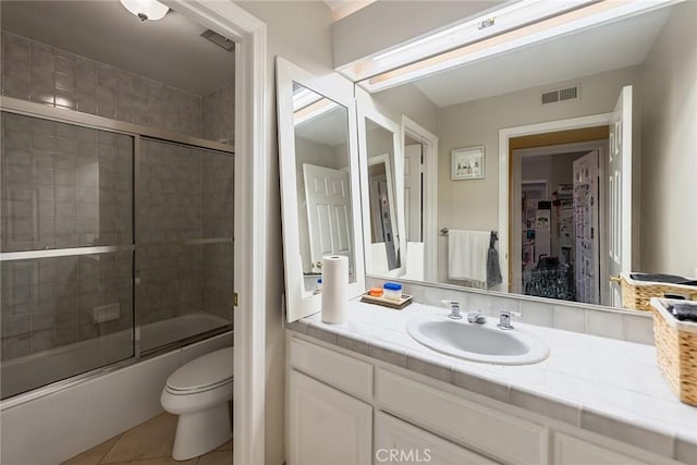 2445 N Santiago Blvd, Orange, CA 92867 - full bath with vanity, tile patterned floors, and combined bath / shower with glass door