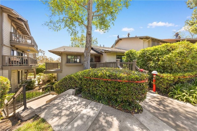 11 Palos Unit 55, Irvine, CA 92612 - view of front of house with a patio and stucco siding
