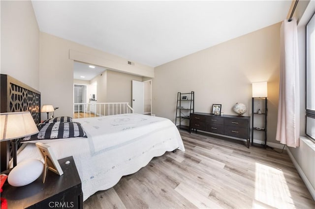 11 Palos Unit 55, Irvine, CA 92612 - bedroom featuring light wood-type flooring