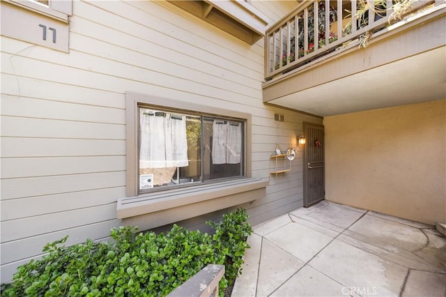11 Palos Unit 55, Irvine, CA 92612 - entrance to property with a balcony and a patio