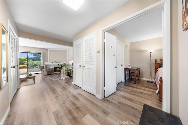 11 Palos Unit 55, Irvine, CA 92612 - hall with light wood finished floors and baseboards