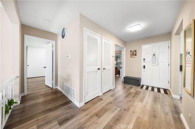 11 Palos Unit 55, Irvine, CA 92612 - foyer featuring light wood-style floors and baseboards