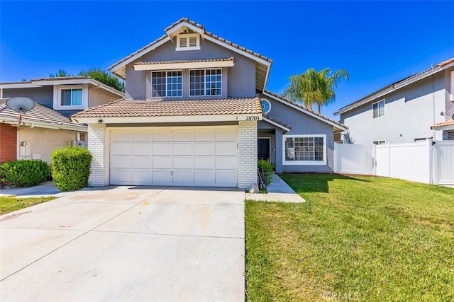 28705 Bridge Water Ln, Menifee, CA 92584 - view of front facade featuring brick siding, driveway, a tiled roof, stucco siding, and an attached garage