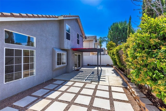 28705 Bridge Water Ln, Menifee, CA 92584 - fenced backyard with a patio and a pergola