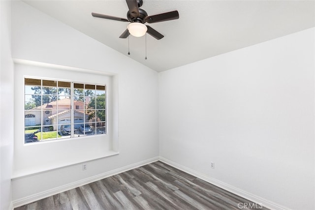 28705 Bridge Water Ln, Menifee, CA 92584 - spare room featuring lofted ceiling, dark wood-style floors, and a ceiling fan