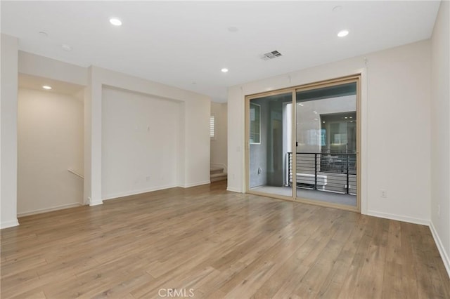 175 Cadence, Irvine, CA 92618 - spare room with light wood-style floors, baseboards, and recessed lighting