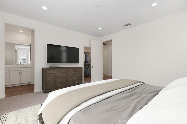 175 Cadence, Irvine, CA 92618 - bedroom featuring carpet, recessed lighting, and connected bathroom