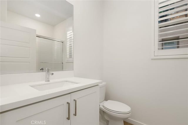 175 Cadence, Irvine, CA 92618 - full bath featuring toilet, vanity, baseboards, and a shower with shower door