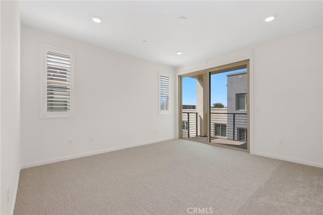 175 Cadence, Irvine, CA 92618 - empty room with light carpet, baseboards, and recessed lighting