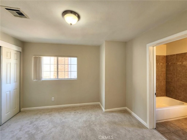 4297 Moonstone Dr, Los Angeles, CA 90032 - unfurnished bedroom with baseboards, carpet flooring, and a closet