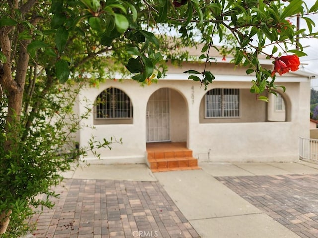 4297 Moonstone Dr, Los Angeles, CA 90032 - entrance to property with stucco siding
