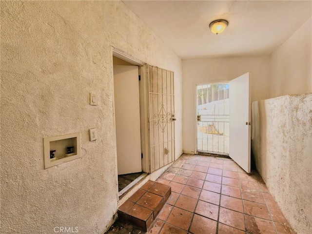 4297 Moonstone Dr, Los Angeles, CA 90032 - laundry room with washer hookup and tile patterned floors
