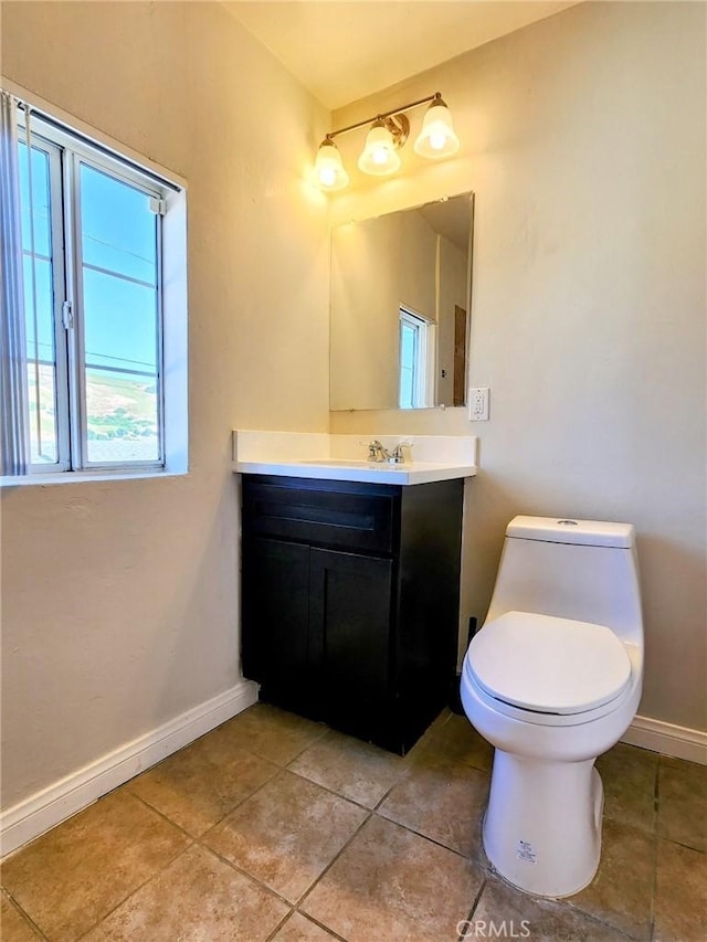4297 Moonstone Dr, Los Angeles, CA 90032 - bathroom with vanity, baseboards, tile patterned flooring, and toilet