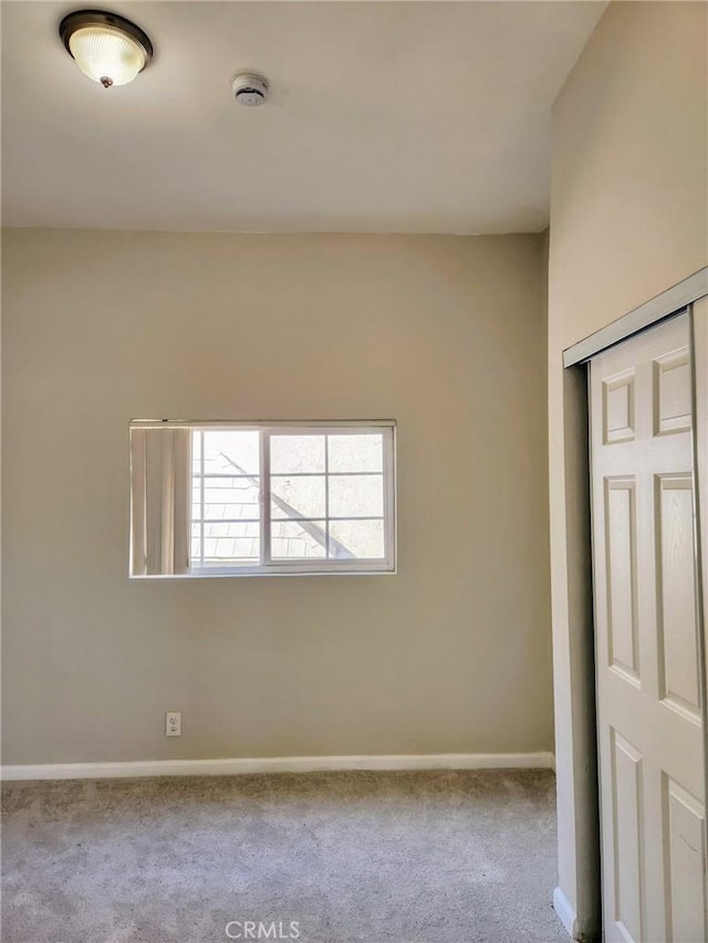 4297 Moonstone Dr, Los Angeles, CA 90032 - unfurnished bedroom featuring baseboards, carpet flooring, and a closet