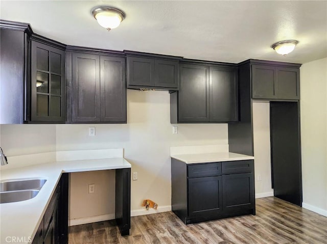4297 Moonstone Dr, Los Angeles, CA 90032 - kitchen with a sink, wood finished floors, baseboards, and light countertops