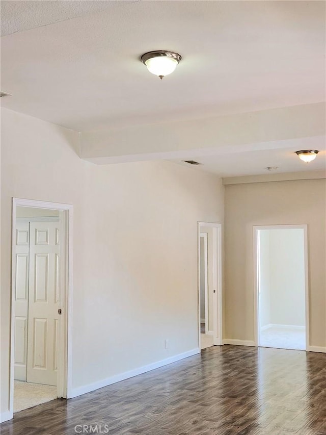 4297 Moonstone Dr, Los Angeles, CA 90032 - empty room featuring dark wood finished floors and baseboards