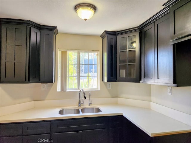 4297 Moonstone Dr, Los Angeles, CA 90032 - kitchen featuring a sink, glass insert cabinets, and light countertops