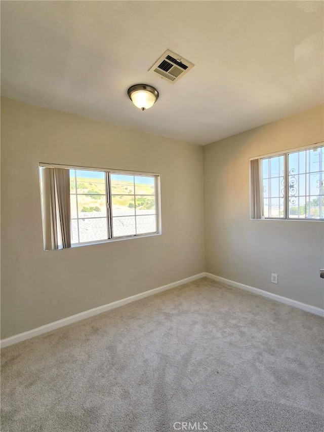 4297 Moonstone Dr, Los Angeles, CA 90032 - carpeted spare room featuring plenty of natural light and baseboards