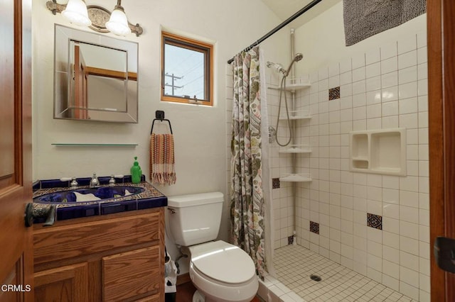 422 Foothill Dr, Fillmore, CA 93015 - bathroom featuring vanity, toilet, and a shower stall